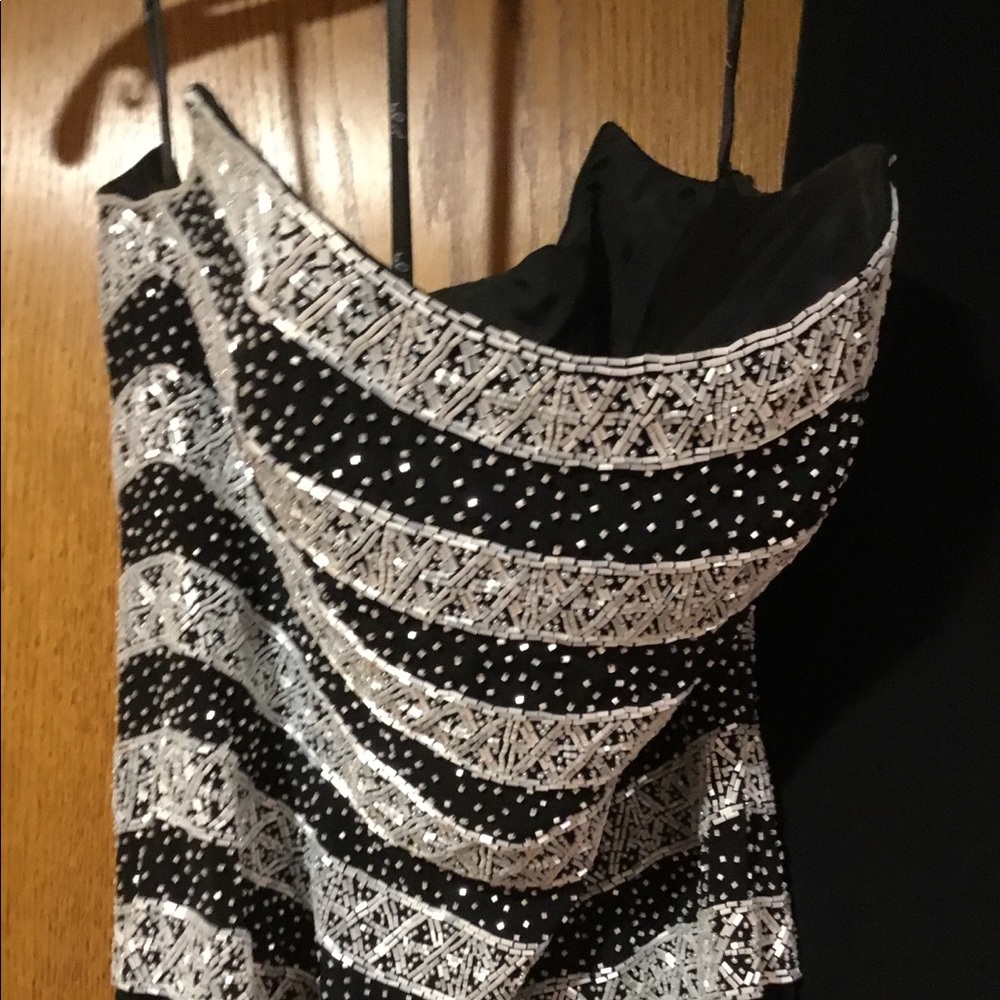 Classy and unique designer prom dress size 8